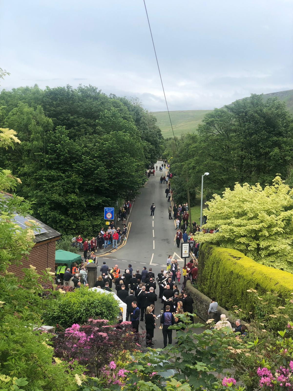 An elevated view down the the street march route in Diggle